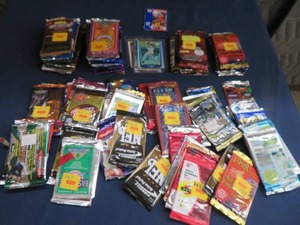 lot 13 image: BOX OF FOIL PACK SPORTS CARDS