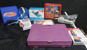 lot 79 image: FITNESS EQUIPTMENT AND VIDEOS