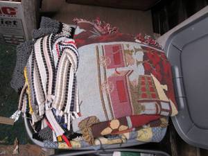 Covered tote of quilts, blankets an...