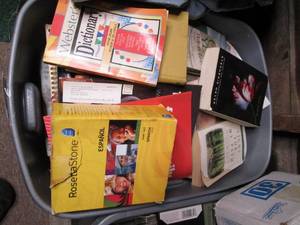 Covered tote full of books and othe...