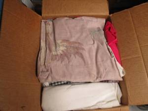 (2) boxes of assorted fabrics and m...