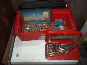 Tool box filled with assorted socke...
