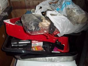 Covered tote filled with painting s...
