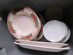 Tote with some Christmas plates, se...