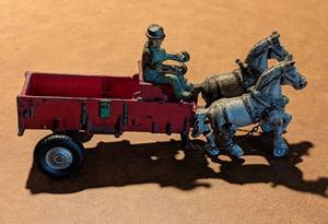 lot 101 image: Cast Iron Horse Drawn Wagon