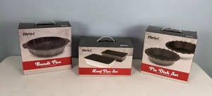 lot 50 image: NEW Parini Baking Pans Bundt Pan, Loaf Pans, Pie Dishes