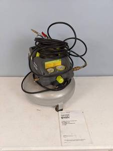 lot 86 image: Craftsman Evolv 3 Gallon Oil-Free Compressor with Brad Nailer and InflationBlowgun Kit