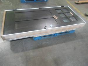 lot 517 image: 36 x 80 STEVES AND SONS 14 Lite Mohogany Exterior Door. Used in Warehouse (ChipDamage over top center Lite, Scratch and Dent. (See Photos).