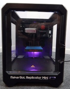 lot 556 image: MAKERBOT REPLICATOR MINI Desktop 3D Printer.  Parts appear to be present, Missing Power cord, Used in Warehouse - Slightly Used. SOLD AS PICTURED