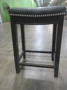 lot 551 image: Leather Upholstered Stool. Approximate Dimensions 18 x 12 x 26 Tall.   SOLD AS PICTURED