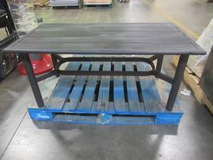 lot 554 image: Aluminum Outdoor Coffee Table. Approximate Dimensions 46 x 24 x 20 12 Tall. Slight DimpleDent on Edge (See Photos).   SOLD AS PICTURED.