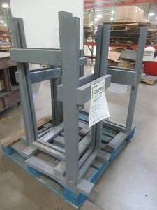 lot 558 image: Large Pallet of Miscellaneous Items Left over from the Retail Store and Warehouse. Wooded FlooringSignage Display Racks Approximate Dimensions 18 x 24 x 43 Tall.