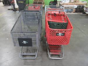lot 560 image: 5 MISCELLANEOUS SHOPPING CARTS (2) Metal, (3) Plastic. Some have sticky wheels, but are in nice condition USE DIN RETAIL STORE.  SOLD AS PICTURED