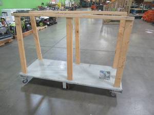 lot 561 image: Roughneck Flatbed 72 x 27 - Customized to hold panels and doors. - USED IN WAREHOUSE.  SOLD AS PICTURED