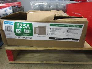 lot 39 image: SIEMENS PN Series 125 Amp 12-Space 24-Circuit Main Lug Plug-On Neutral Load Center Indoor with Copper Bus (BOX IS DAMAGED)