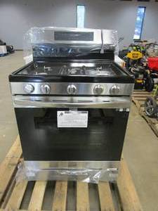 lot 197 image: SAMSUNG NX60A6511SS 6 cu. ft. Smart Wi-Fi Enabled Convection Gas Range with No Preheat AirFry in Stainless Steel (VERY SMALL DENT IN BOTTOM FRONT PANEL, SEE PHOTOS)