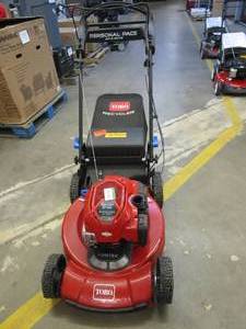 lot 219 image: TORO 21465 Recycler 22 in. Briggs & Stratton SmartStow Personal Pace High-Wheel Drive Gas Walk Behind Self Propelled Lawn Mower (RUNS, MISSING GAS CAP)
