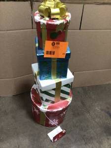 lot 23 image: Home Accents Holiday 3 ft Christmas Stacked Gift Boxes with LED Lights  Open Box Customer Returns See Terms on Auction
