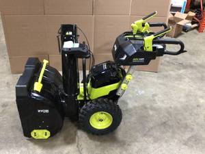lot 43 image: Ryobi 40V HP Brushless 18 in. Battery Powered Rear Tine Tiller with (4) 6.0 Ah Batteries and Charger  Customer Returns See Terms on Auction
