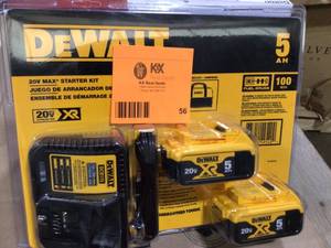 lot 56 image: DEWALT 20-Volt MAX XR Premium Lithium-Ion 5.0Ah Battery Pack (2-Pack), Charger & Kit Bag Customer Returns See Terms on Auction
