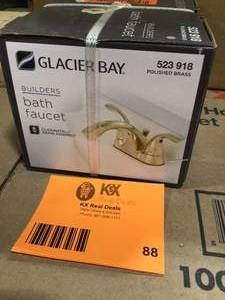 lot 88 image: Glacier Bay Builders 4 in. Centerset 2-Handle Low-Arc Bathroom Faucet in Polished Brass Customer Returns  See Terms on Auction