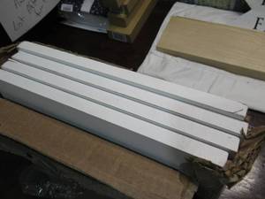 lot 58 image: Rubbermaid 12 X 48 White Shelving (4 Shelves)