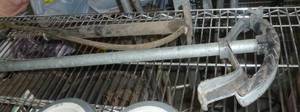 lot 72 image: pipe bender and vintage pump and jack