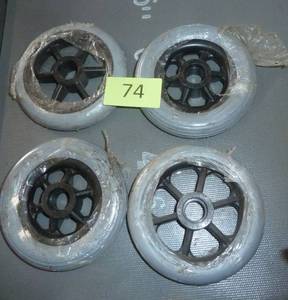 lot 74 image: 4 wheelchair wheels