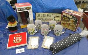 lot 180 image: Group of functional items - 2 sets of coffee cups, heated mug, umbrella, luggage tags, and more