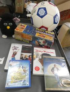 lot 189 image: 3 DVDs, Playstation Spongebob, soccer ball and Furby