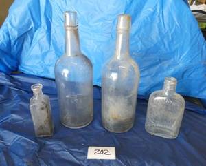lot 202 image: Vintage whiskey bottles in good condition
