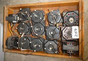 lot 259 image: Wood box with 14 small vintage new motors