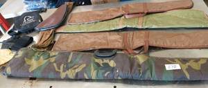 lot 270 image: group of gun cases and gloves