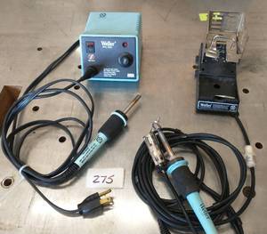 lot 275 image: Weller soldering and De-soldering irons and holder