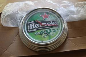 lot 8 image: Heineken Battery Wall Clock