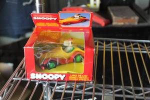 lot 113 image: Snoopy Diecast Sports Car Collectible (in original packaging)