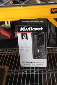 lot 121 image: Kwikset Electronic Dead Bolt (in original packaging)