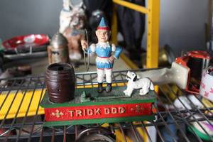lot 146 image: Trick Dog Cast Iron Table Statue