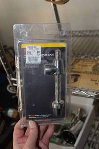 lot 171 image: Coupler Lock (in original packaging)
