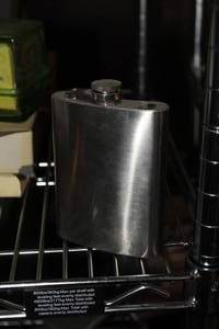 lot 210 image: Size 8oz Stainless Steel Flask
