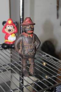 lot 197 image: 8 Coal Miner Cast Iron Coin Bank