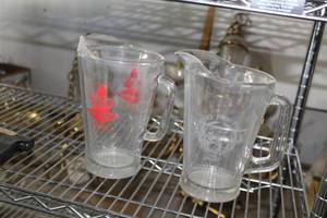 lot 79 image: Lot of (2) Glass Beer Pitchers