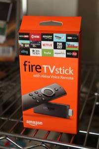 lot 266 image: Amazon Fire TV Stick (in original packaging)