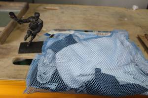 lot 307 image: Lot of (2) Lacrosse Jersey with Ryan Cousins Statue