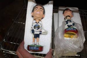 lot 277 image: Lot of (2) KARE 11 Bobble Head Doll