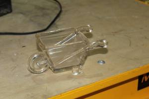 lot 355 image: Wheelbarrow Glass Table Statue