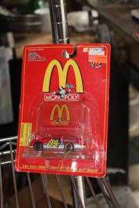 lot 298 image: 164 Scale Adult McDonalds Monopoly Diecast NASCAR Stock Car Collectible (in original packaging)