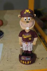 lot 384 image: 7 Goldy U of M Baseball Bobble Head Doll