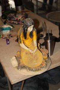 lot 395 image: Native American Woman Cooking Table Statue