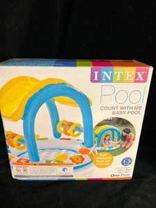lot 42 image: Infant & Toddler Pool & Floaties